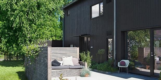 Hus med en koselig terrasse. Foto