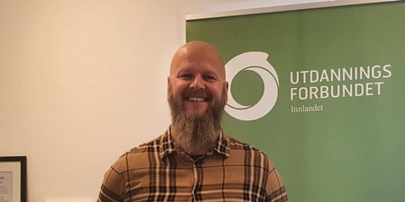 Bilde av en smilende fylkesleder Thore Johan Nærbøe